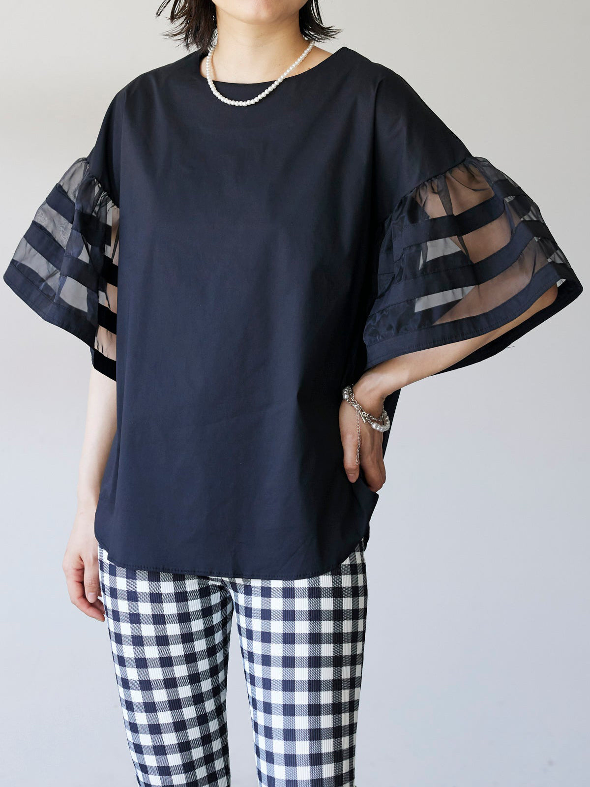 Organdy line flare sleeve blouse in 2 colors