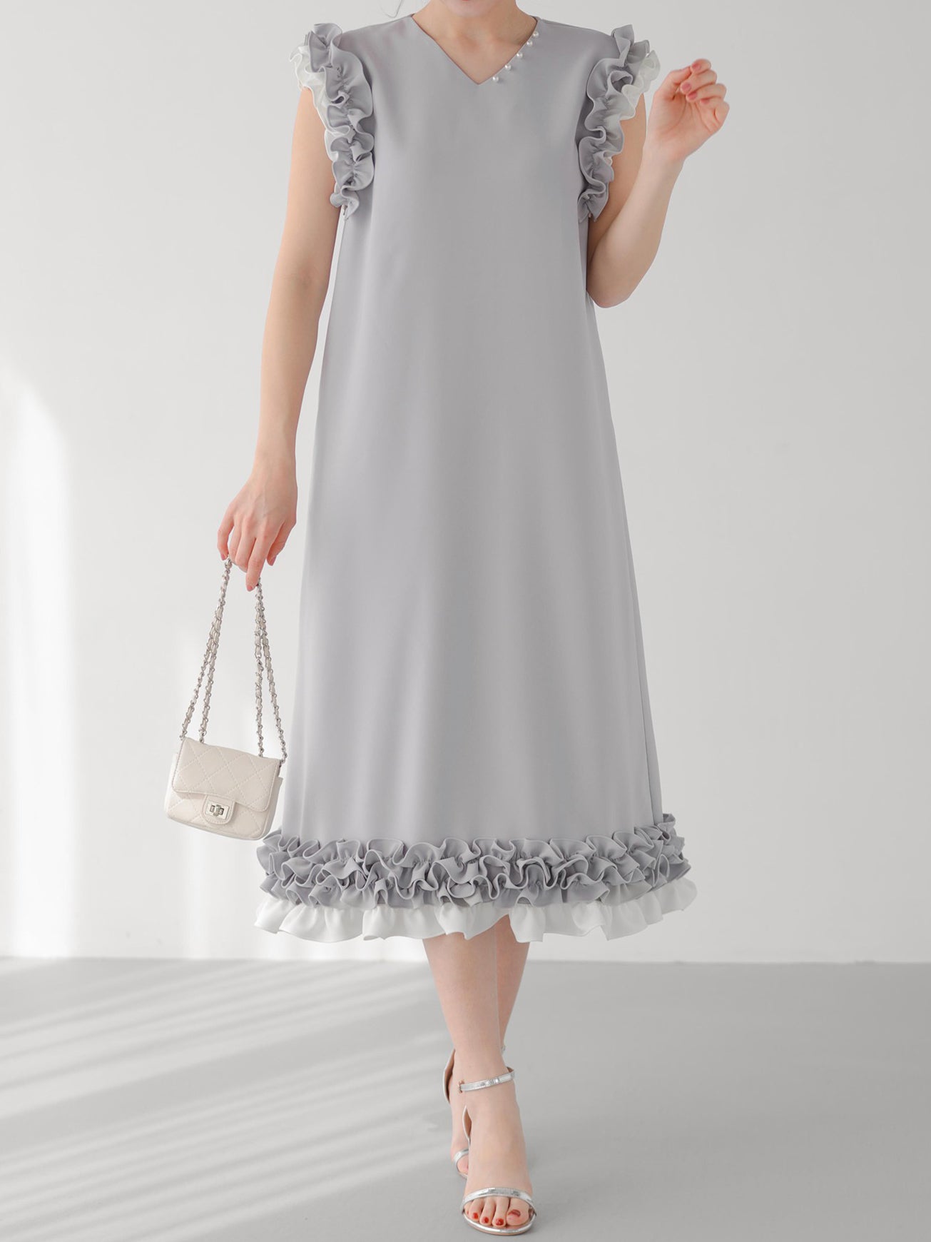 Whipped frill sleeve dress in 2 colors