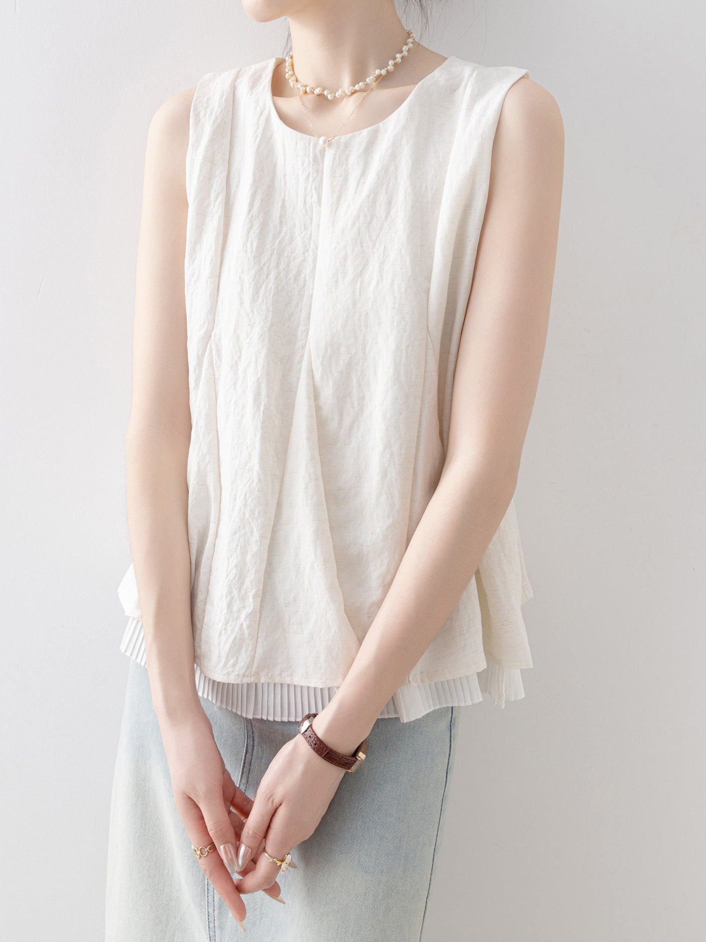 Pleated Docking Flare Hem Sleeveless Blouse - 2 colors