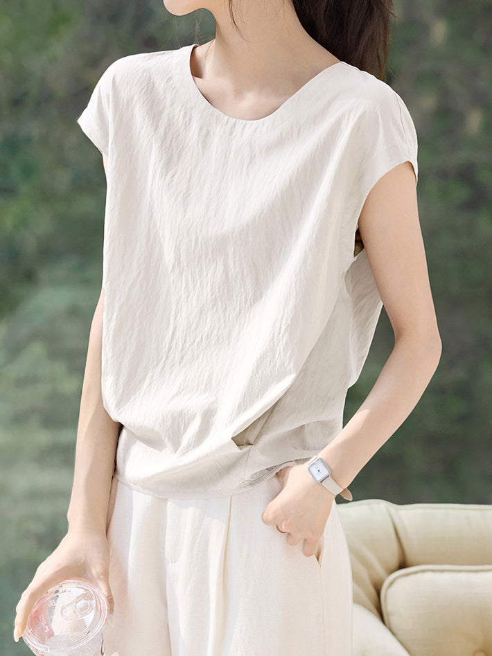 Back button tucked-in blouse in 2 colors