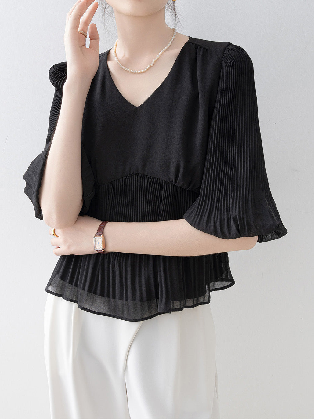 V-neck peplum pleated blouse in 2 colors